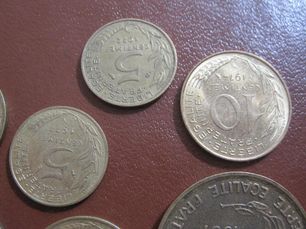 Lot of 9 French coins: 1 1951 50 francs; 1 1965 20 centimes; 4 10 centimes (1963, 74,79 and 83) and