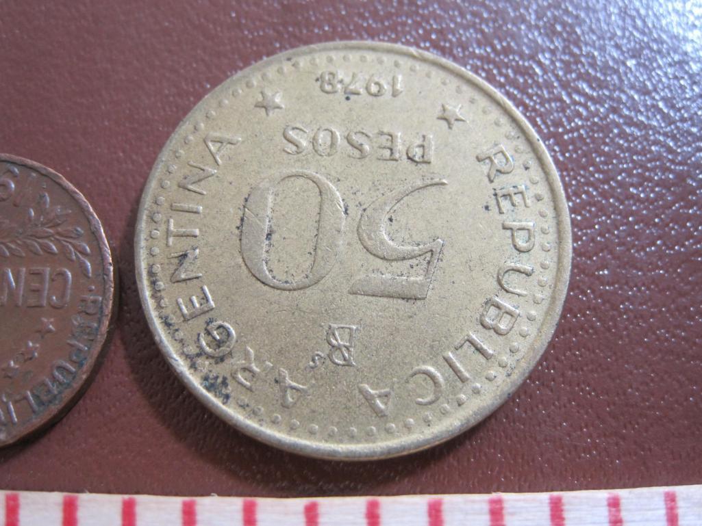 Two coins: one 1982 Republic of Panama un centesimo coin and one 1978 Argentina 50 pesos coin