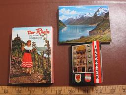 Three small postcard books: one "Der Rhein von Mainz bis Dusseldorf," one Innsbruck and one "Lac des