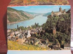 Three small postcard books: one "Der Rhein von Mainz bis Dusseldorf," one Innsbruck and one "Lac des