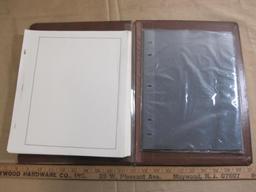 Lot of more than three dozen blank stamp collecting album pages AND package of unused paper/plastic