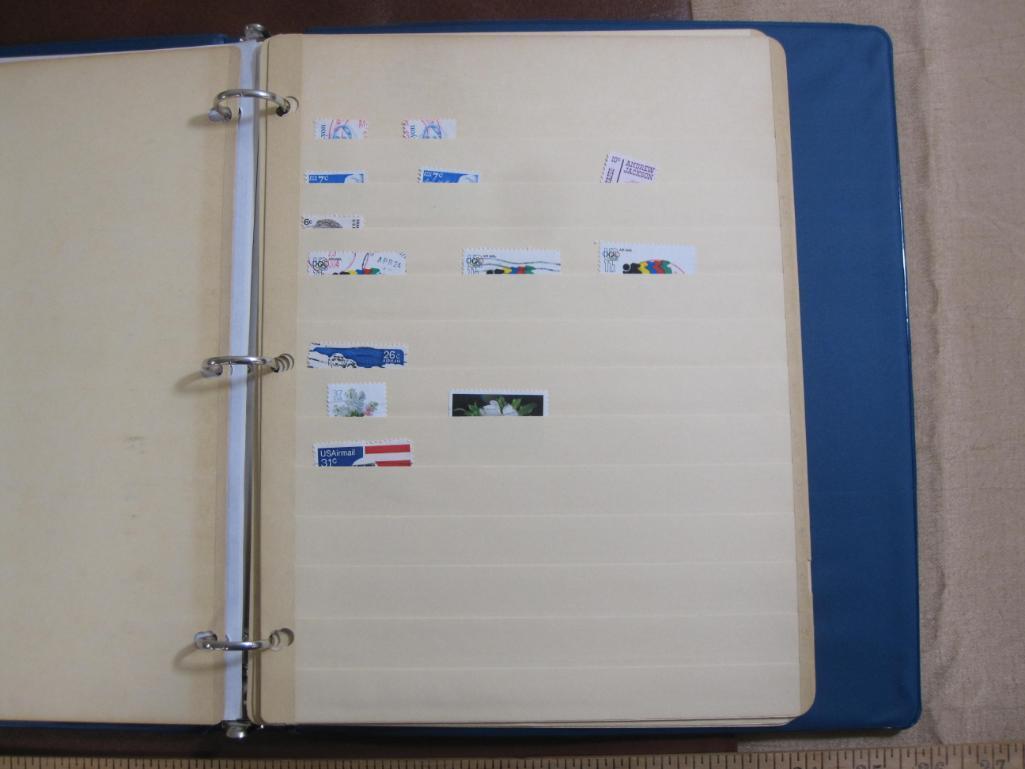 3 ring binder containing 3 pages of mounted cancelled dinosaur stamps from various countries and