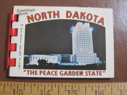 4 small (3 in. by 4. in. ) souvenir photo booklets of North Dakota, the State of Washington, Indians