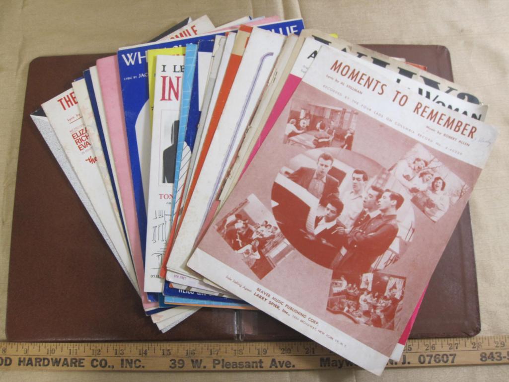 Lot includes over one dozen pieces of piano sheet music including Moments to Remember by Al