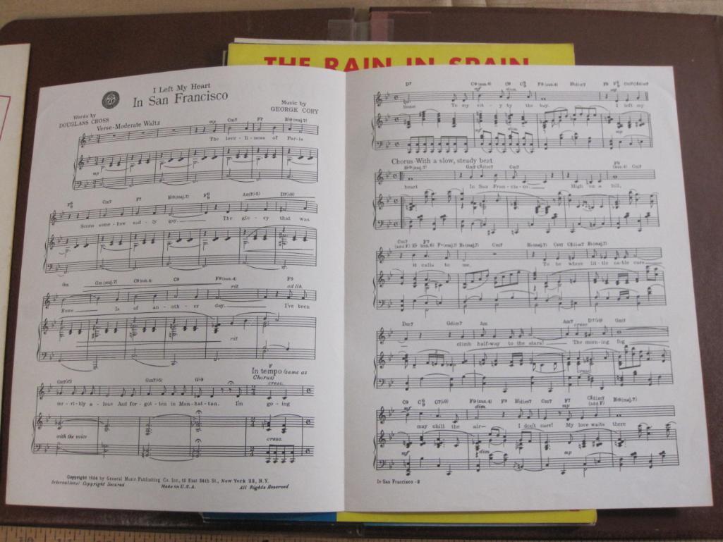 Lot includes over one dozen pieces of piano sheet music including Moments to Remember by Al