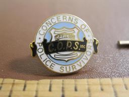 TWO police-themed pins, one US Park Police and one Concerns Of Police Survivors (C.O.P.S.)