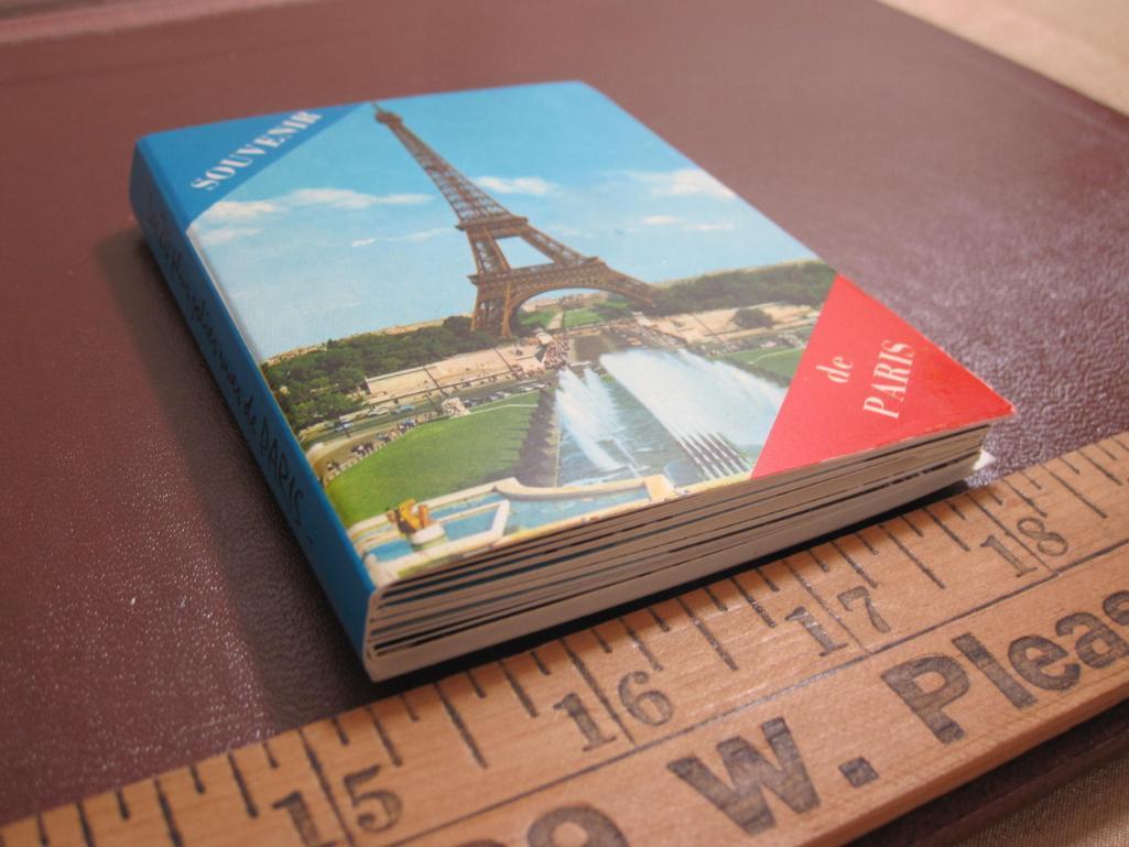 4 small Paris souvenir photo booklets, one specifically on Notre Dame de Paris