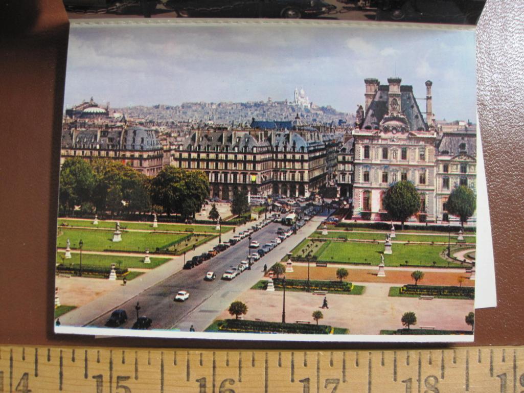 4 small Paris souvenir photo booklets, one specifically on Notre Dame de Paris