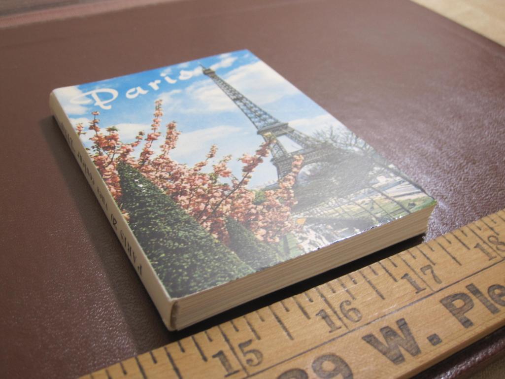 4 small Paris souvenir photo booklets, one specifically on Notre Dame de Paris