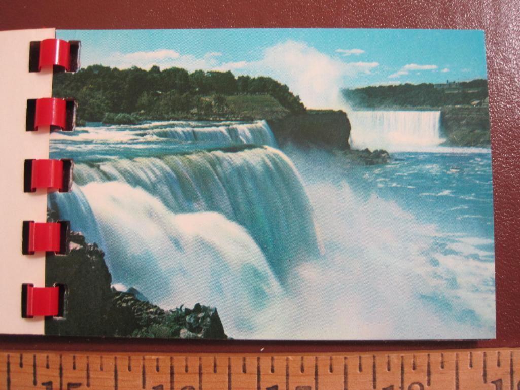 Four small souvenir photo booklets (Niagara Falls, Innsbruck, Austria and Roman sites in France) as