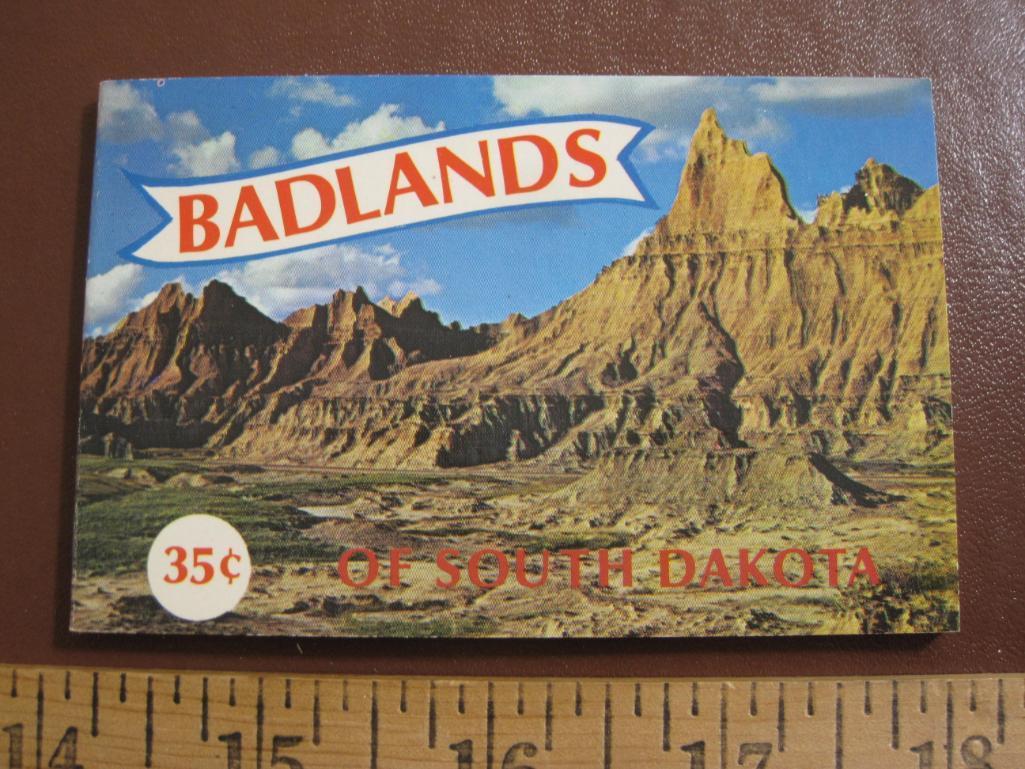 Four small South Dakota souvenir photo booklets (two on Badlands, one of the Black Hills and one of