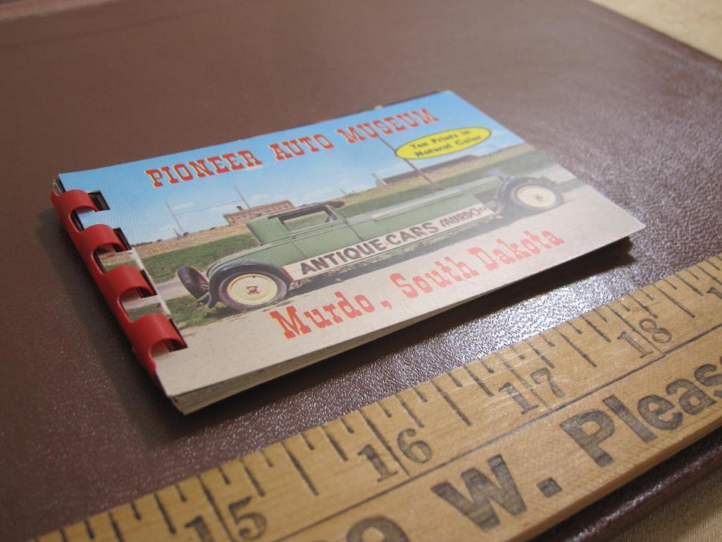 Four small South Dakota souvenir photo booklets (two on Badlands, one of the Black Hills and one of