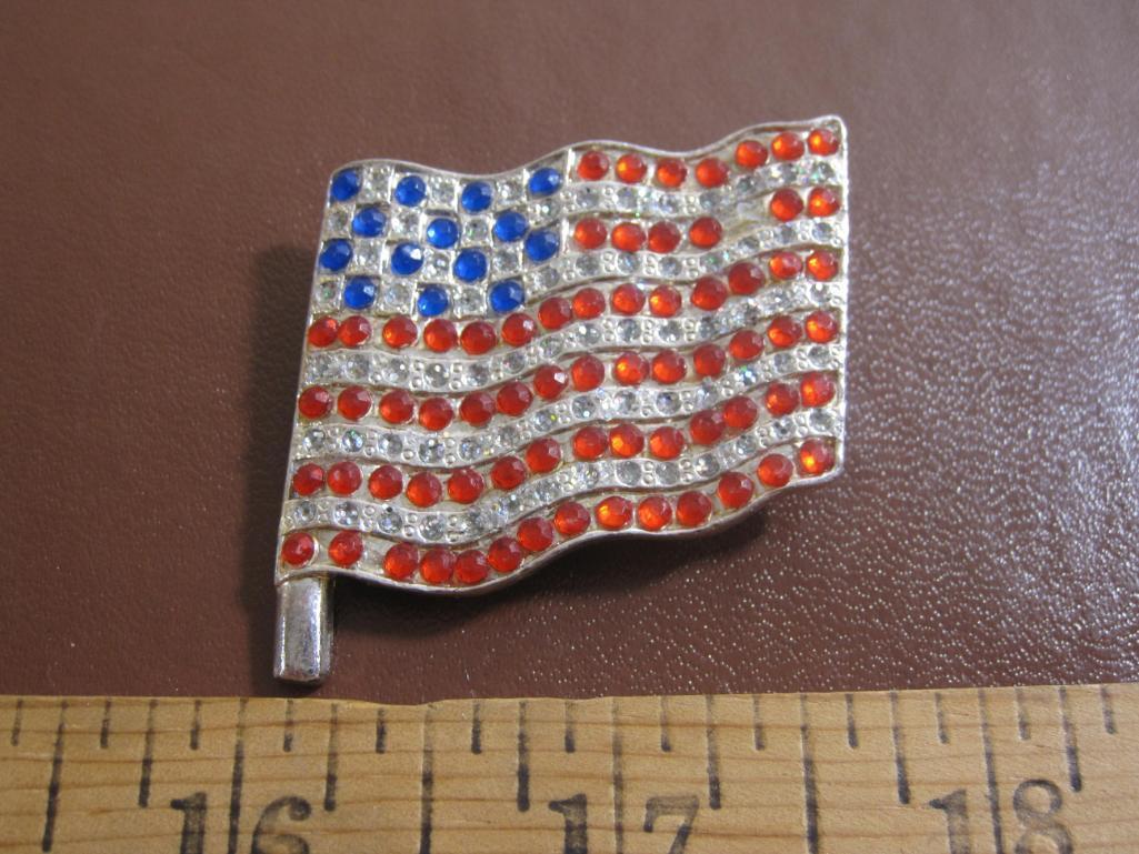 Lot includes two UA flag pins and one 1976 Bicentennial Celebreation of the USA pendant