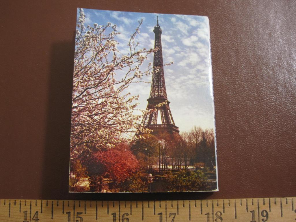 Four small souvenir photo booklets of Paris