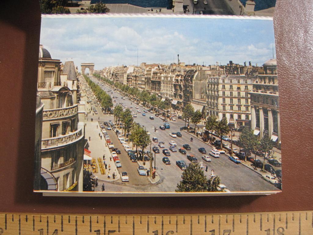 Four small souvenir photo booklets of Paris