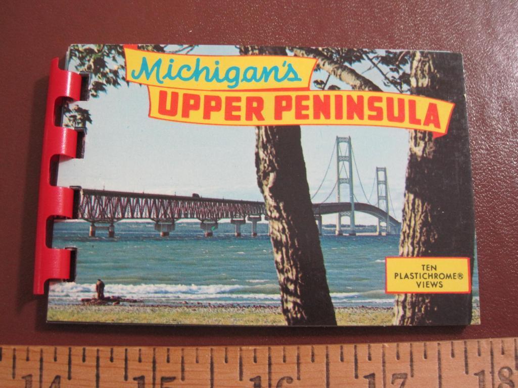 Four small souvenir photo booklets: two on Michigan's Upper Peninsula, one on the Mackinac Bridge