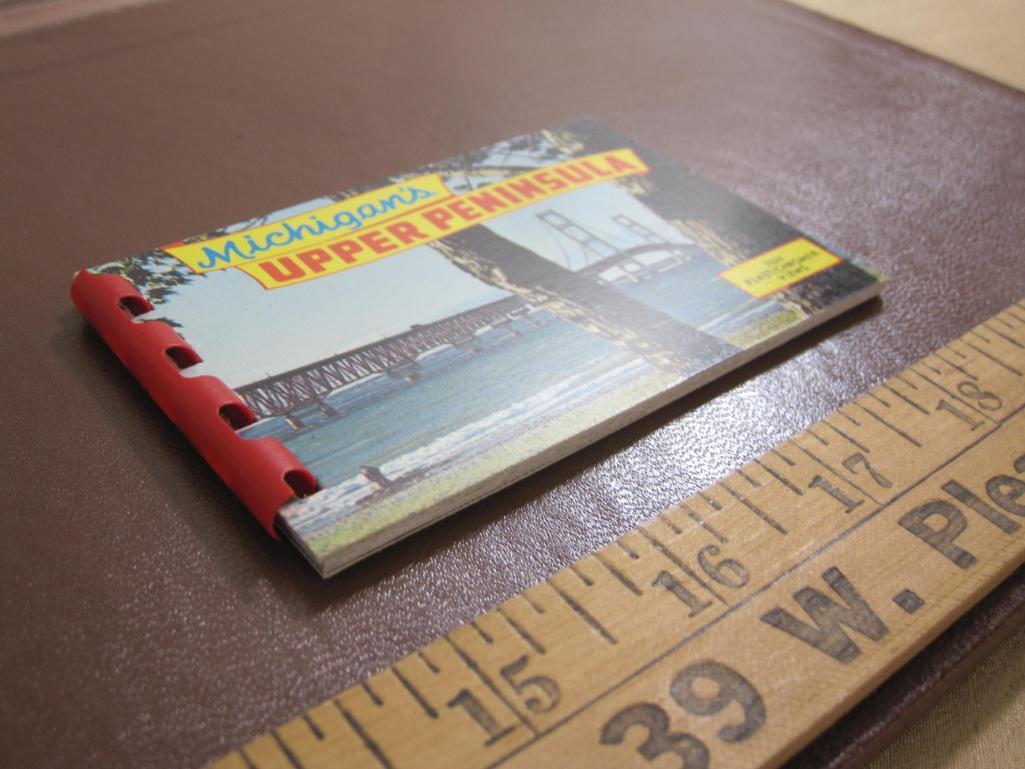 Four small souvenir photo booklets: two on Michigan's Upper Peninsula, one on the Mackinac Bridge