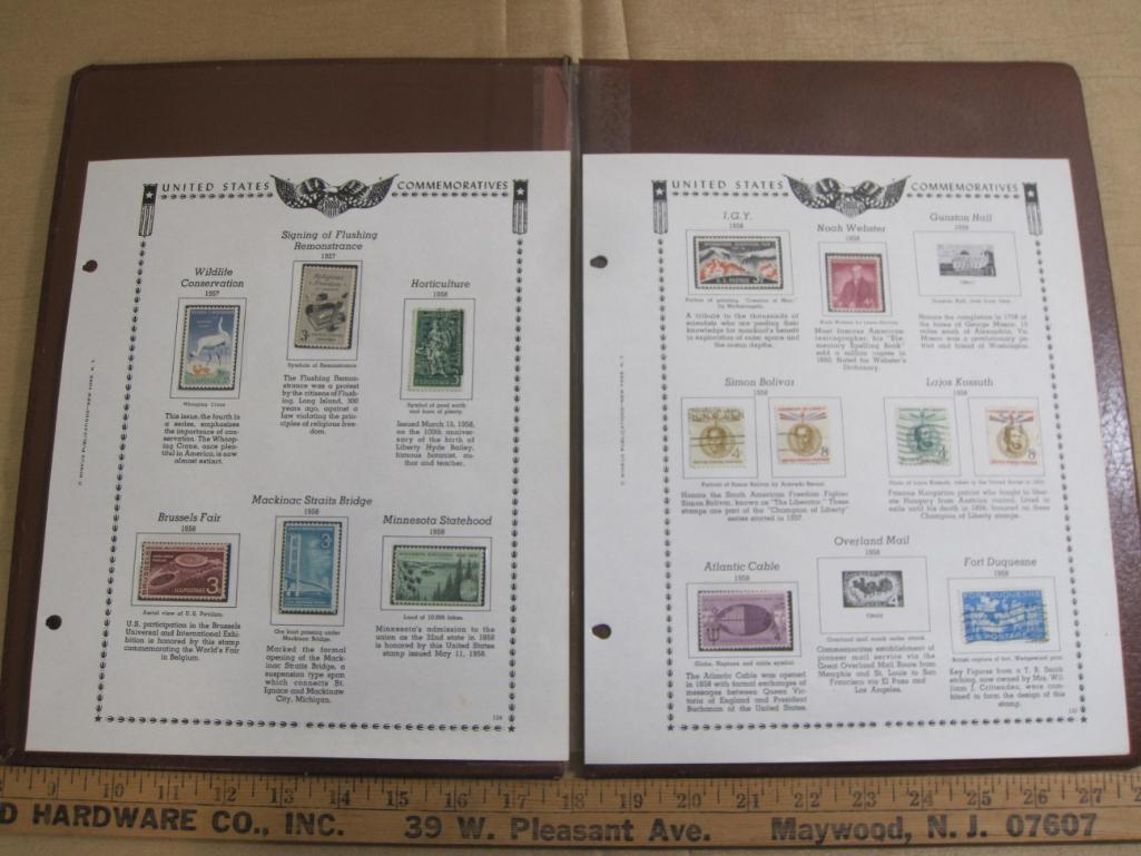 Two stamp collecting album pages printed by Minkus Publications; includes 8 mounted mint stamps and