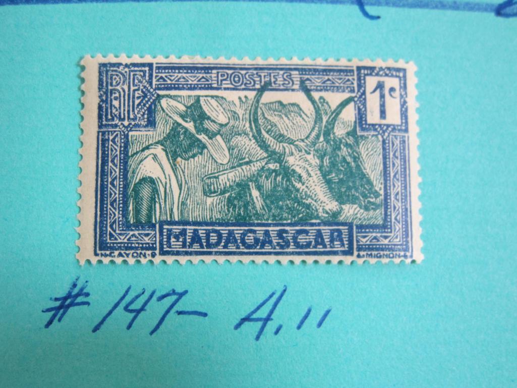 Three hinged stamps from Madagascar (Malagasy Republic): one 1930 stamp (14-.A.11) and two from