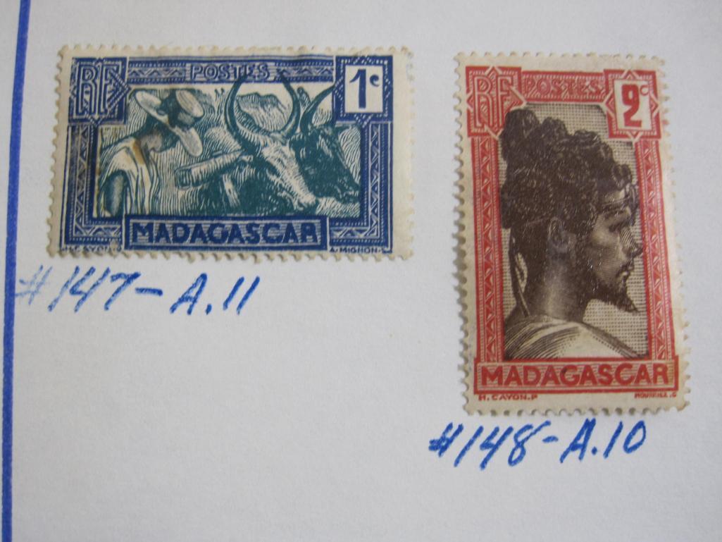Three hinged stamps from Madagascar (Malagasy Republic): one 1930 stamp (14-.A.11) and two from