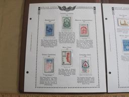 Two completed stamp collecting album pages printed by Minkus Publications; includes twelve mounted