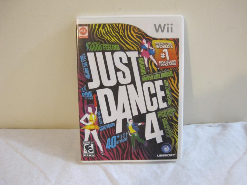 Lot of Wii Games including Just Dance 4, Transformers the Game, and Cabela's Big Game Hunter, all