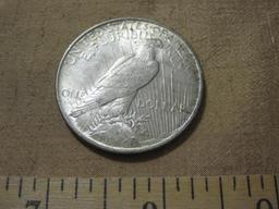 One 1922 Silver Peace Dollar, 26.7 g