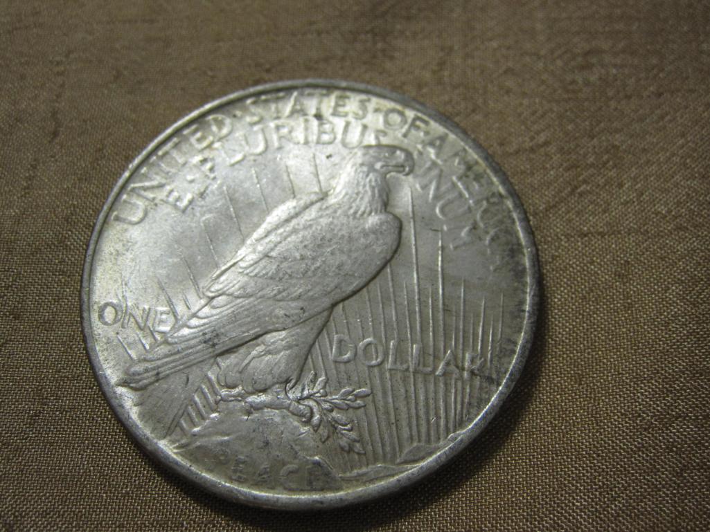 One 1922 Silver Peace Dollar, 26.7 g