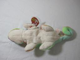 Four TY Beanie Babies including Rainbow (2 variations), Iggy, and Smoochy, all tags included and