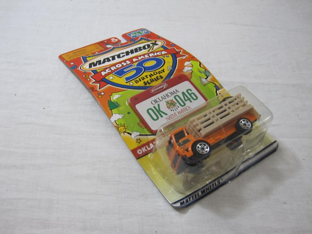 Three Matchbox Across America 50th Birthday Series Cars including Kansas Weather Radar Truck,