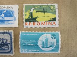 Lot of 4 postage stamps, including three canceled Romania stamps (2 of them from 1962 and picturing