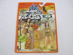 Two Land of the Lost Action Figures including Shung and Electronic Talking Christa, both sealed in