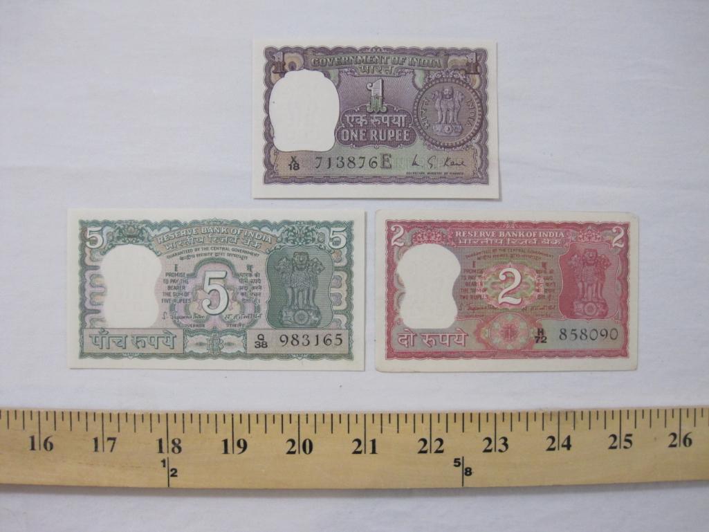 Three Notes of Reserve Bank of India Paper Currency including one rupee, two rupees, and five rupees