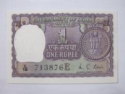 Three Notes of Reserve Bank of India Paper Currency including one rupee, two rupees, and five rupees