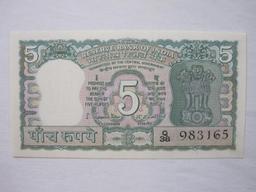 Three Notes of Reserve Bank of India Paper Currency including one rupee, two rupees, and five rupees