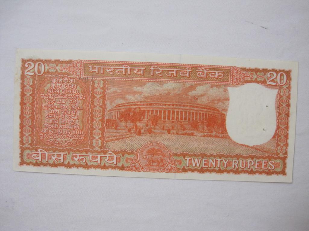 Three Notes of Reserve Bank of India Paper Currency including five rupees (has staple holes), 10