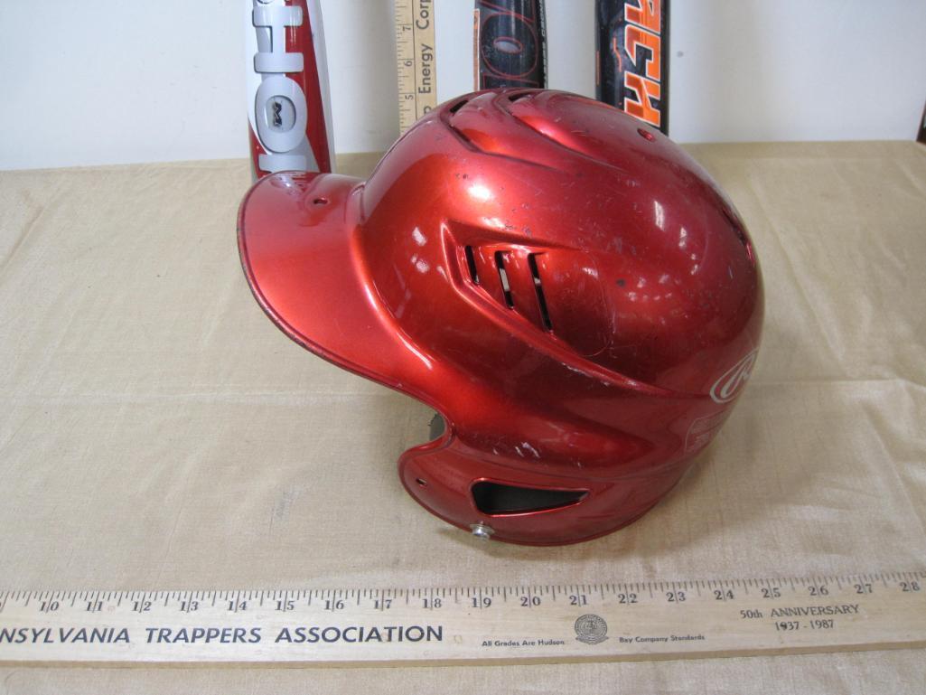 Child's Baseball Helmet and three aluminum baseball bats