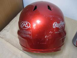 Child's Baseball Helmet and three aluminum baseball bats