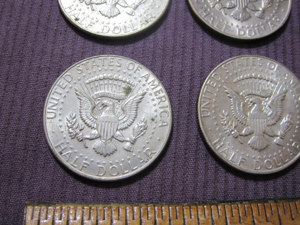 Four John F. Kennedy Half Dollars: 1 1966; 2 1968; 1 1972