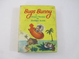 Seven Vintage Children's Books including Flintstones, Yogi Bear, Bug Bunny, Mickey Mouse and more,