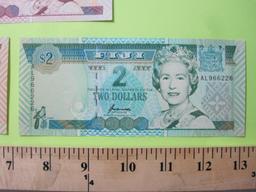 Three Notes of Fiji Paper Currency: two, five, and ten dollars