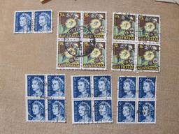 Lot of mostly canceled Australia postage stamps, many featuring Queen Elizabeth II. Also animals