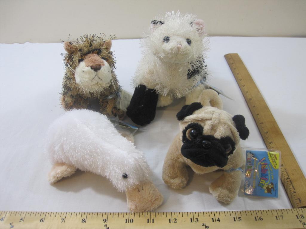 Lot of 4 Webkins Plush Toys including leopard, domino cat, googles, and pug, with original tags