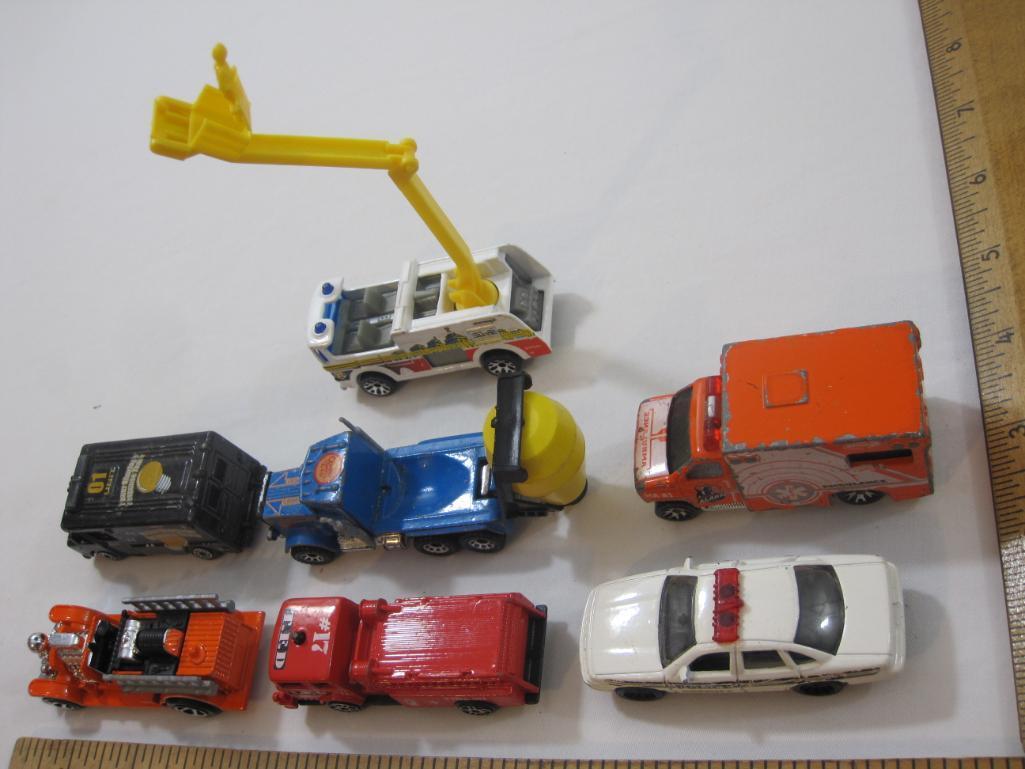 7 Miniature Cars from Maisto, Matchbox, and Hot Wheels including Snorkel, cement mixer, fire