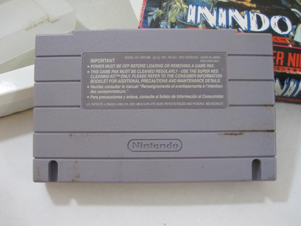 Two Super Nintendo Games including Super Castle Vania IV and Inindo: Way of the Ninja, both in