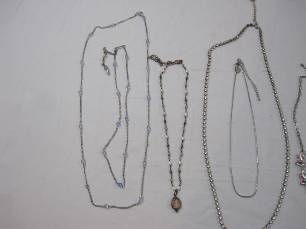 Lot of Assorted Silver Tone Jewelry including Sterling Pendant, Lia Sophia and more, 5 oz