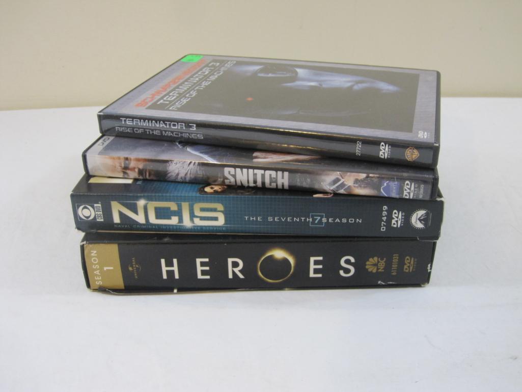 Lot of DVDs including Heroes Season 1, NCIS Season 7, Snitch and Terminator 3: Rise of the Machines,