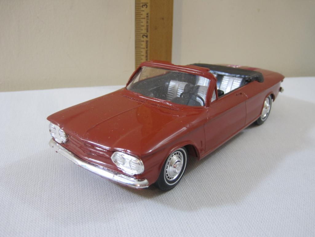1964 Ember Red Chevrolet Corvair Convertible Promo Model Car with black and grey interior, 5 oz