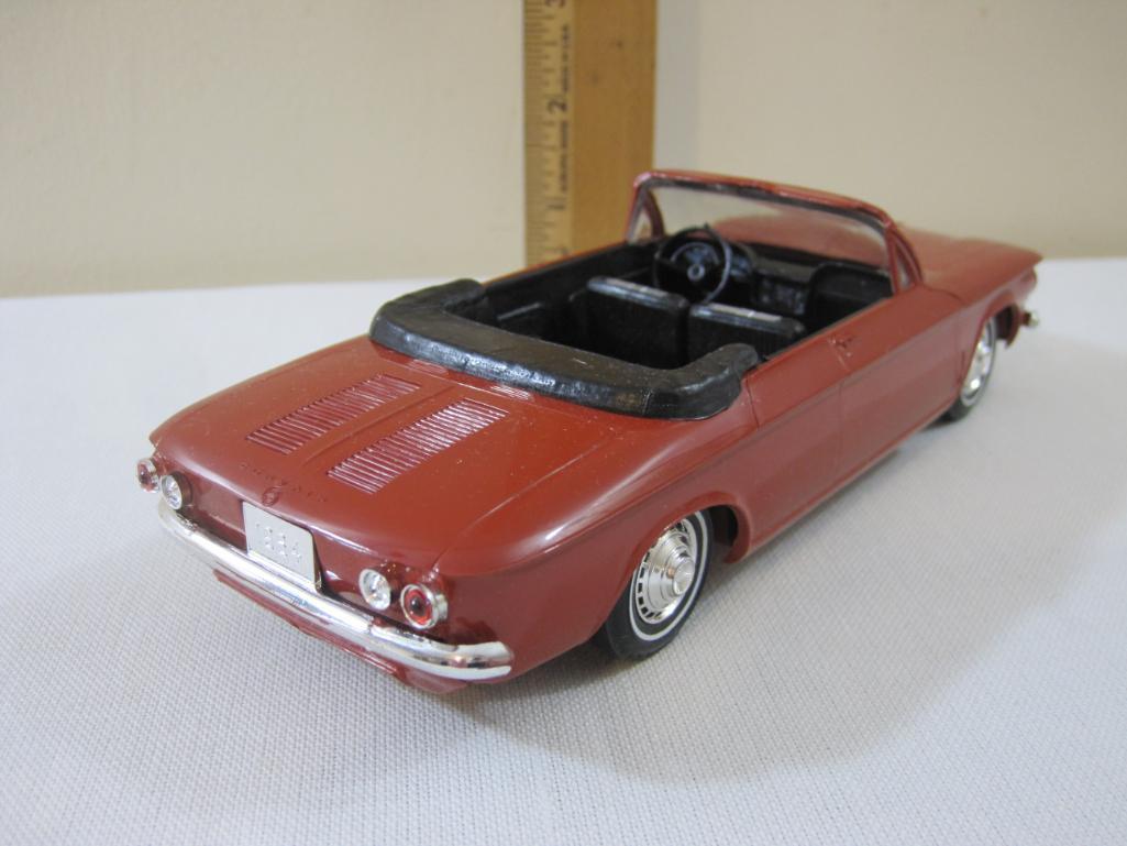 1964 Ember Red Chevrolet Corvair Convertible Promo Model Car with black and grey interior, 5 oz