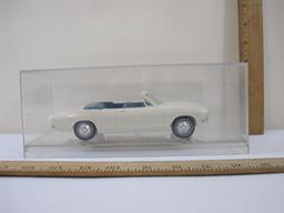 1965 White Chevrolet Corvair Promo Model Car, 2-Door Convertible with blue interior, in plastic